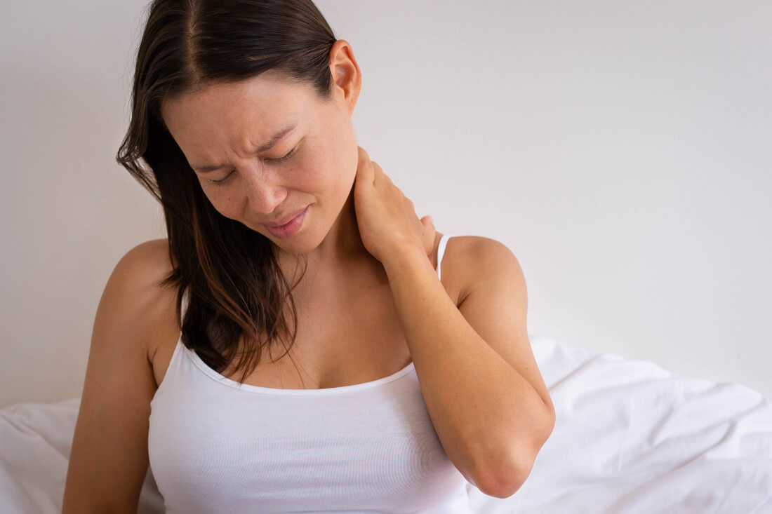 Sore neck from holding baby? Tips for easing neck pain for new mums